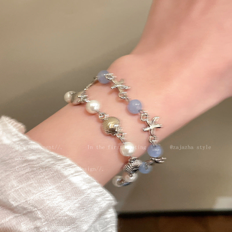 Wholesale Holiday style island star shell bracelet